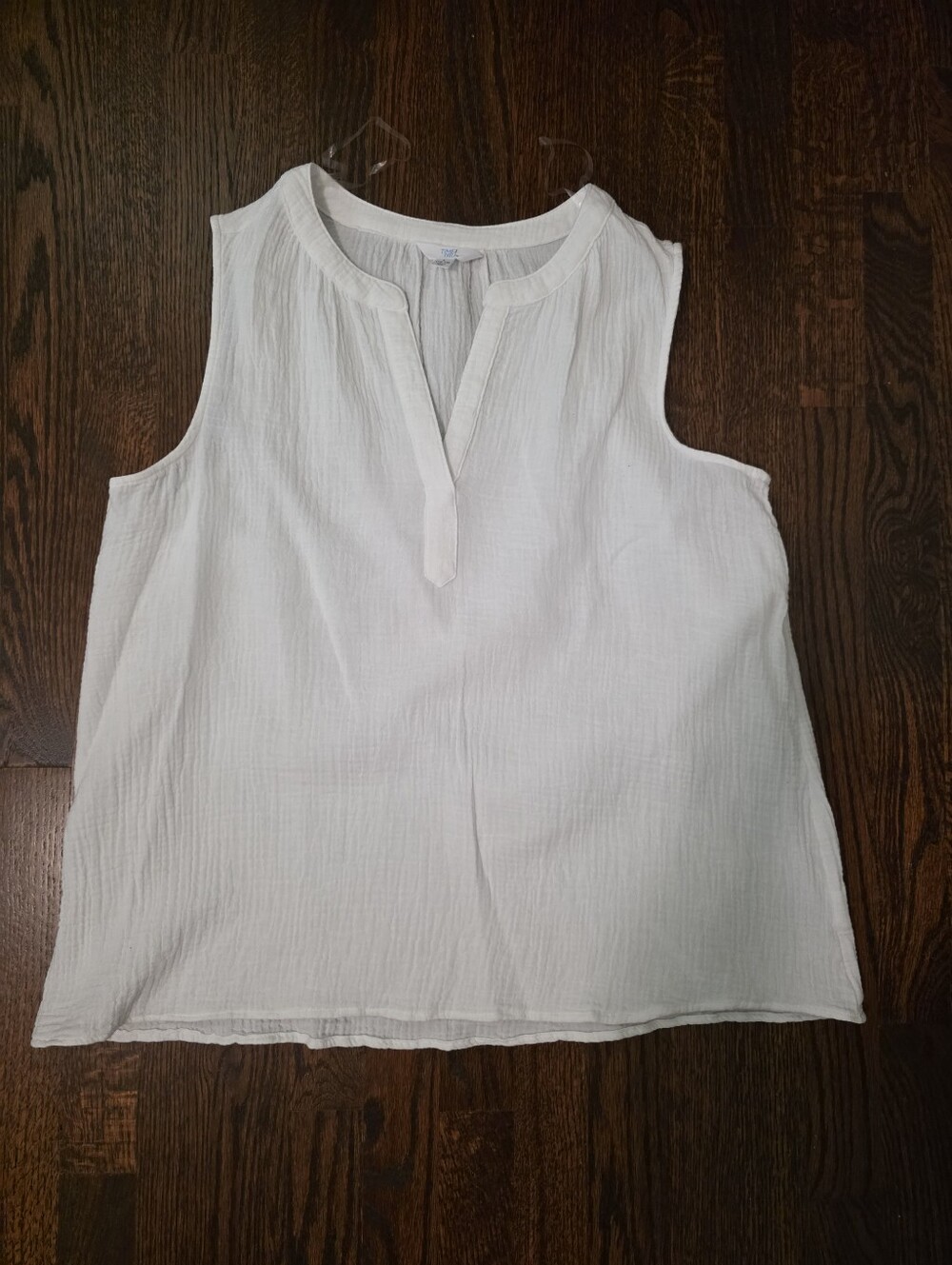 White Sleeveless V-Neck Top